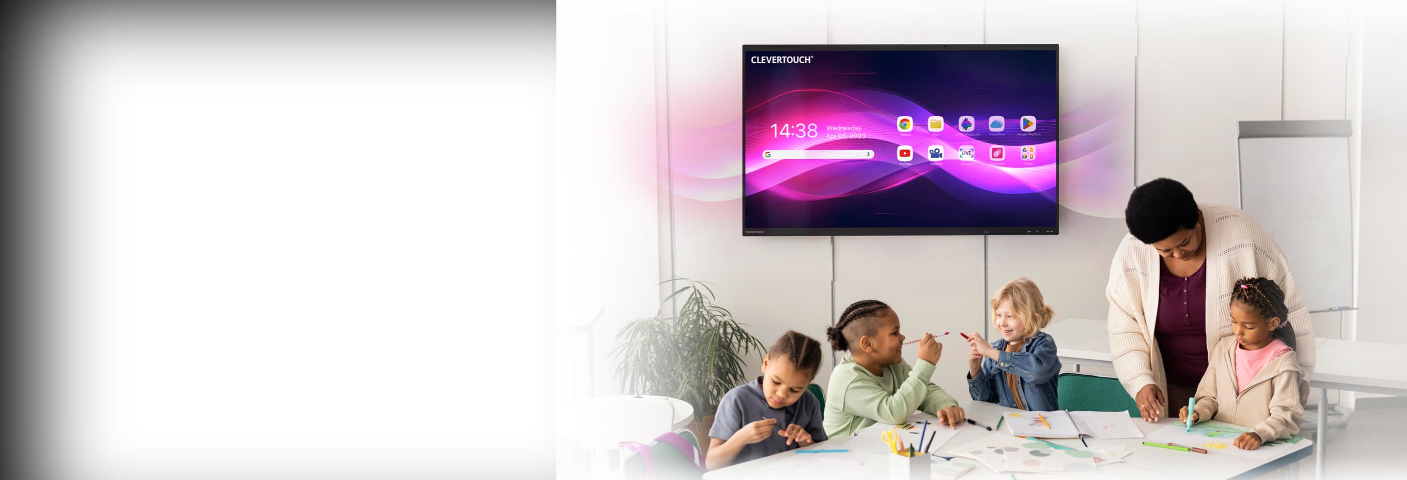 Clevertouch IMPACT Lux 2 86in interactive display, wall-mounted in a classroom with students and teacher working around it